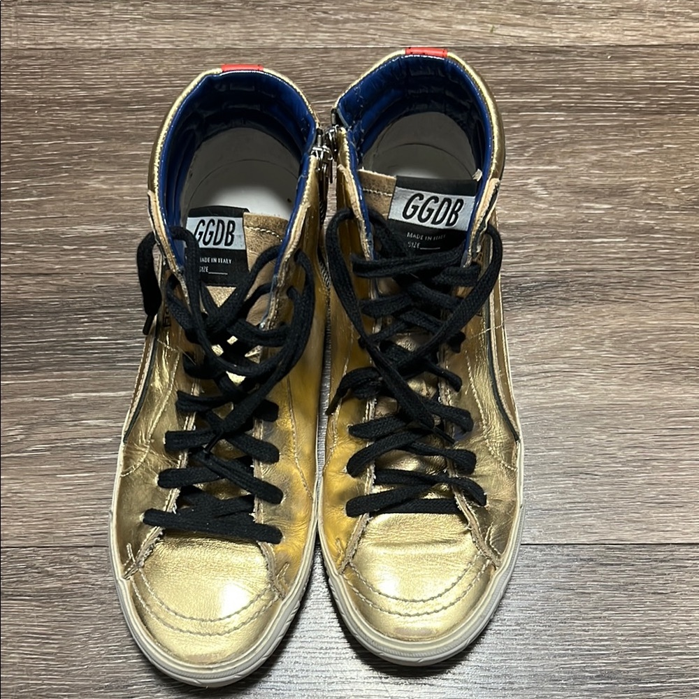 Golden Goose Gold and Black Sneakers